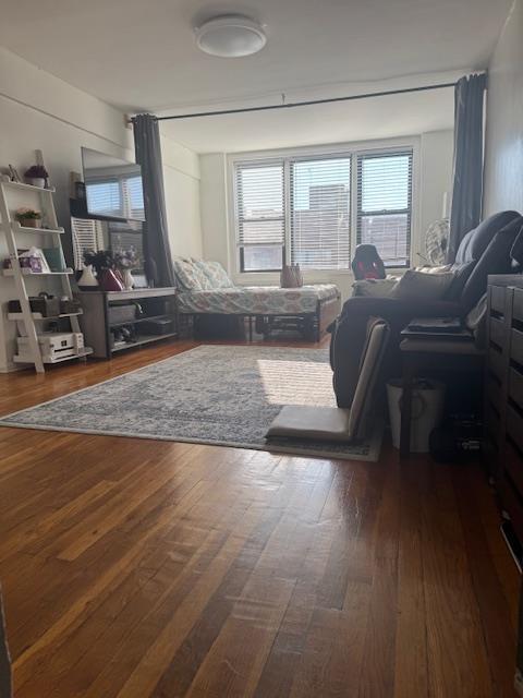 83-30 Vietor Ave Unit 716, Elmhurst, NY 11373 - living area with wood finished floors