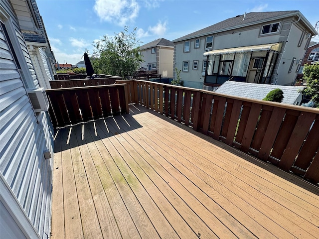 10221 Davenport Ct, Howard Beach, NY 11414 - wooden terrace with a residential view