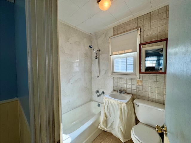10221 Davenport Ct, Howard Beach, NY 11414 - full bath featuring tub / shower combination and tile walls
