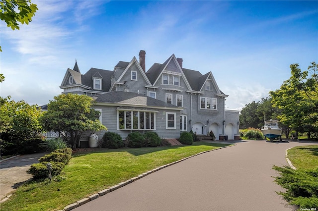 9 Convent Ln, Center Moriches, NY 11934 - shingle-style home featuring a chimney and a front yard
