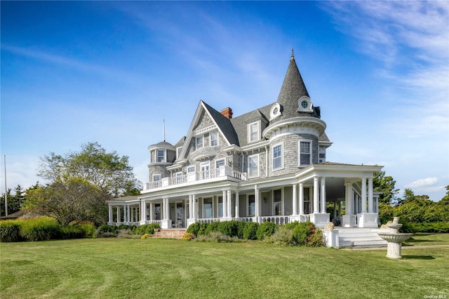9 Convent Ln, Center Moriches, NY 11934 - view of front of property with a porch and a front yard
