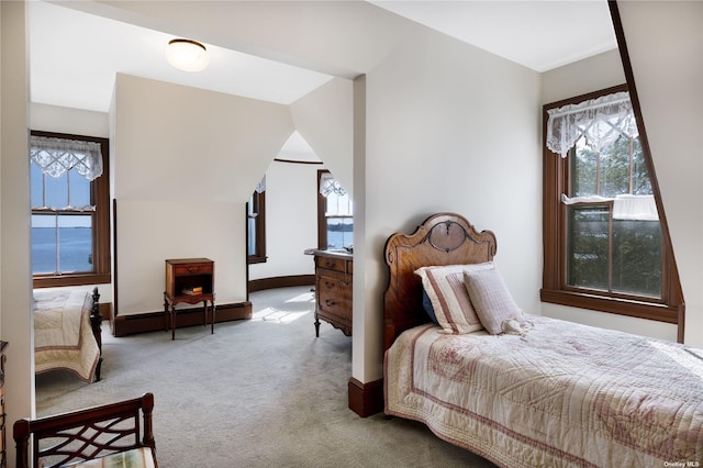 9 Convent Ln, Center Moriches, NY 11934 - bedroom featuring carpet, multiple windows, and a baseboard radiator