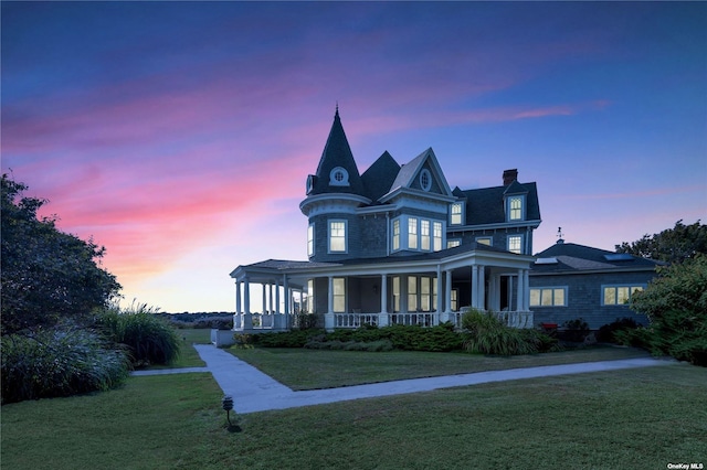 9 Convent Ln, Center Moriches, NY 11934 - victorian home featuring covered porch, a front lawn, and a chimney