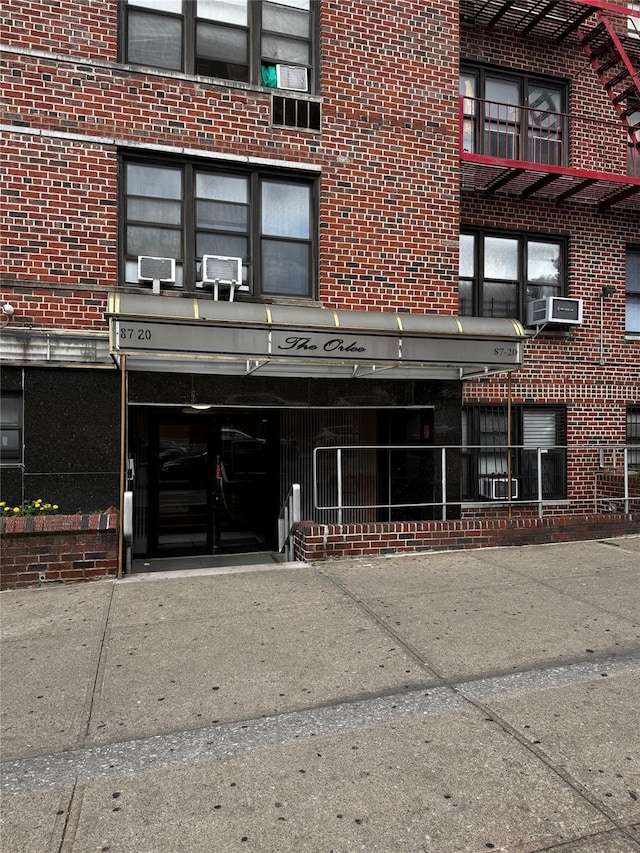 87-20 175th St Unit 6-J, Jamaica, NY 11432 - view of building exterior with cooling unit