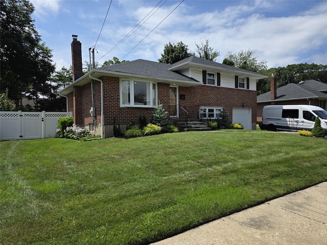 3 Lourae Dr, Massapequa Park, NY 11762 - tri-level home with brick siding, a chimney, an attached garage, and a gate