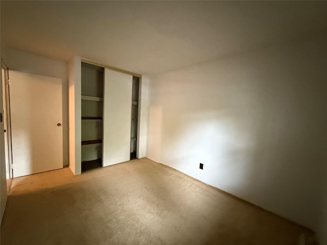 719 Greenbelt Pkwy W, Holbrook, NY 11741 - unfurnished bedroom with a closet and carpet floors