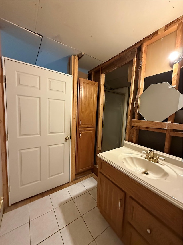 719 Greenbelt Pkwy W, Holbrook, NY 11741 - bathroom with vanity and tile patterned flooring