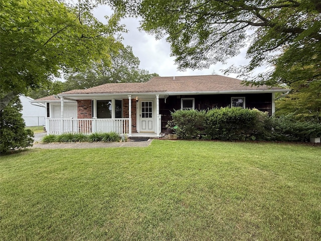 719 Greenbelt Pkwy W, Holbrook, NY 11741 - ranch-style home featuring covered porch, an attached garage, and a front yard