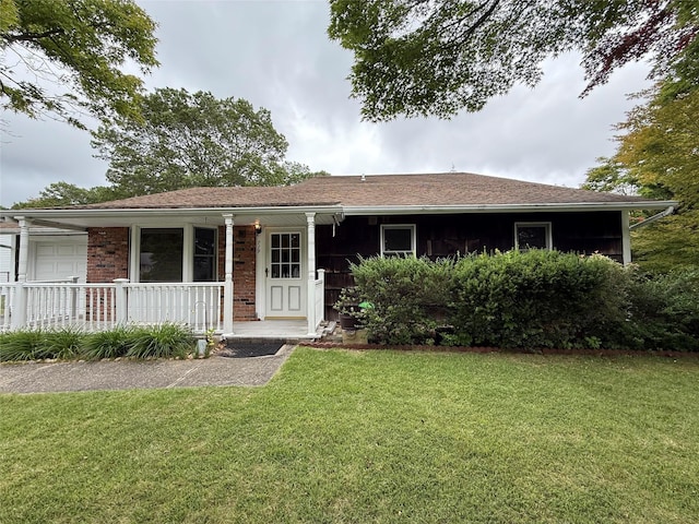 719 Greenbelt Pkwy W, Holbrook, NY 11741 - ranch-style house featuring covered porch and a front lawn