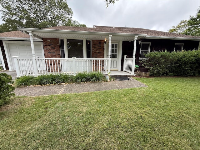 719 Greenbelt Pkwy W, Holbrook, NY 11741 - ranch-style home with a porch, brick siding, a front yard, an attached garage, and a shingled roof