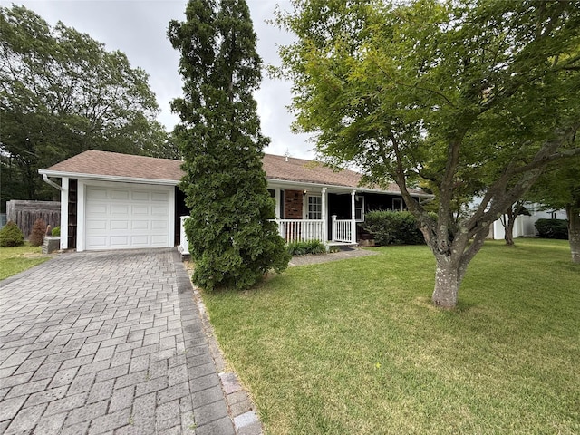 719 Greenbelt Pkwy W, Holbrook, NY 11741 - ranch-style home featuring covered porch, decorative driveway, and a garage