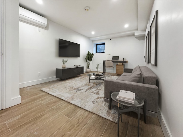 21-31 Shore Blvd Unit 1G, Astoria, NY 11105 - living room with a wall mounted AC, wood finished floors, and recessed lighting