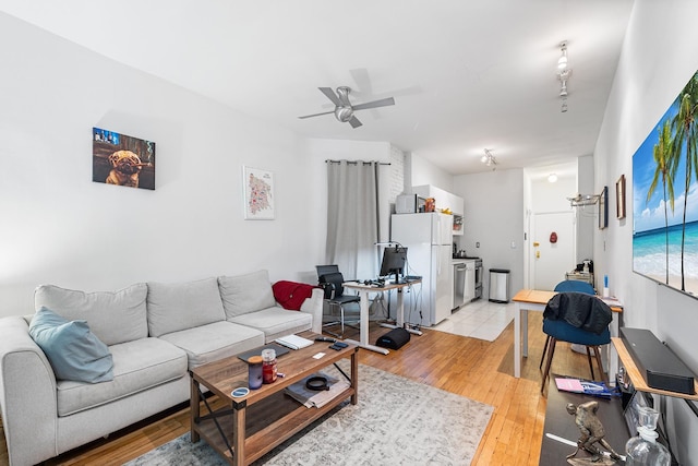 313 E 89th St Unit 2C, New York Manhattan, NY 10128 - living room with a ceiling fan and light wood-style floors