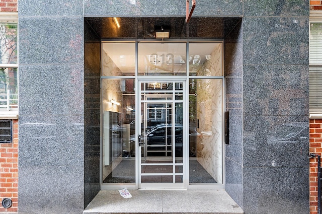 313 E 89th St Unit 2C, New York Manhattan, NY 10128 - property entrance featuring brick siding