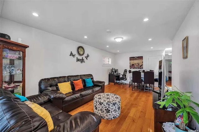 9-03 127th St, College Point, NY 11356 - living room with light wood-type flooring and recessed lighting