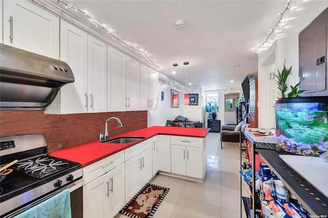9-03 127th St, College Point, NY 11356 - kitchen with gas range, range hood, light tile patterned flooring, open floor plan, and tasteful backsplash