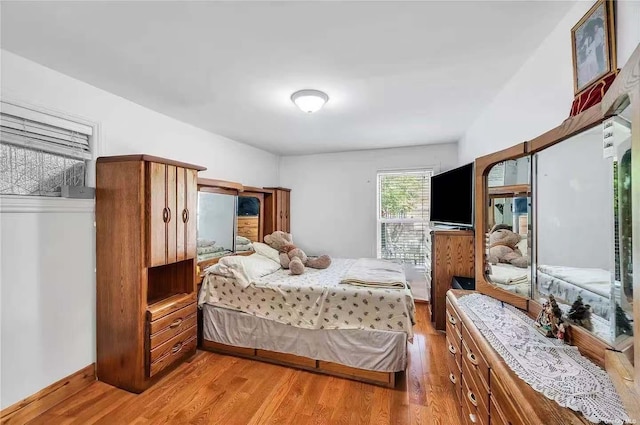 9-03 127th St, College Point, NY 11356 - bedroom featuring light wood finished floors