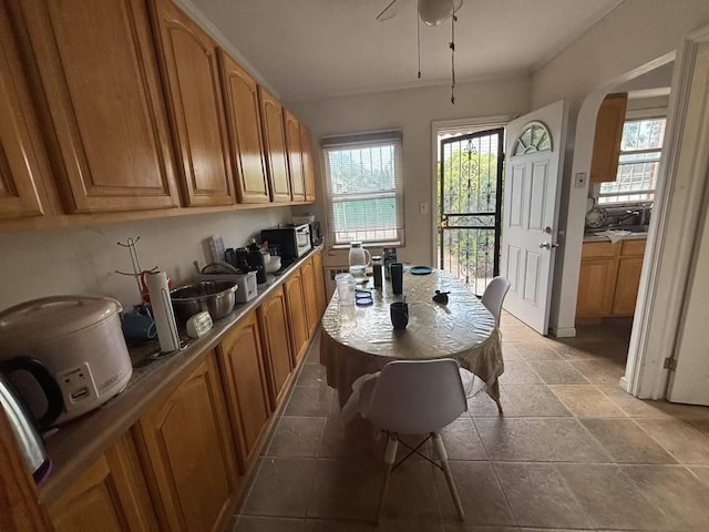 22-01 149th St, Whitestone, NY 11357 - dining area featuring arched walkways and a ceiling fan