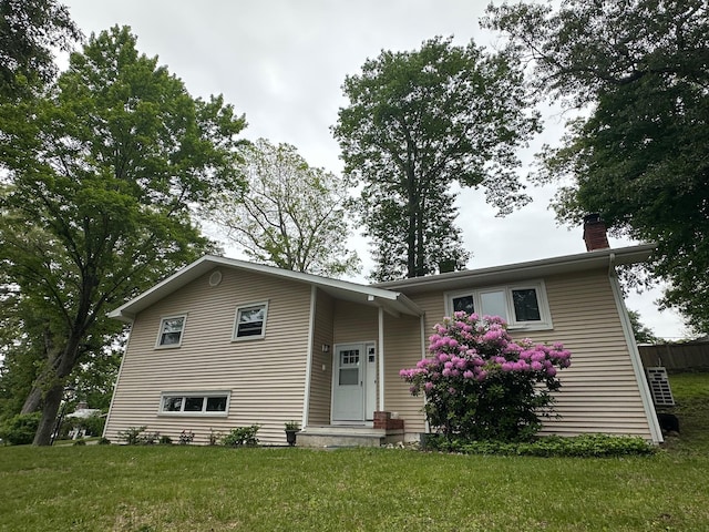 5 High St, Bedford Hills, NY 10507 - split foyer home with a front yard and a chimney