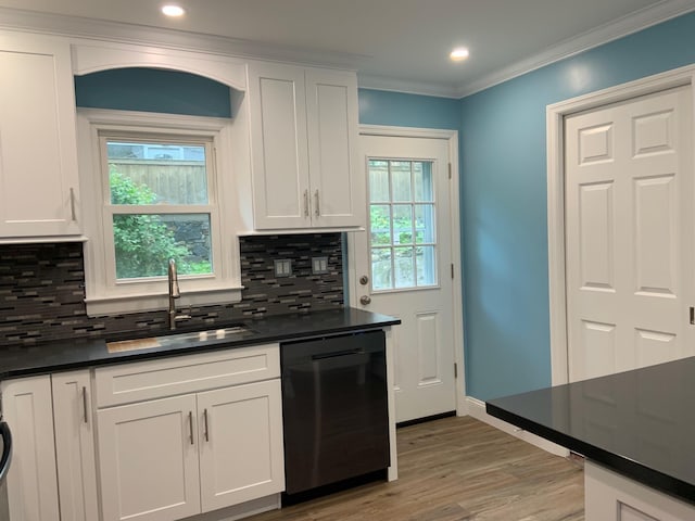 5 High St, Bedford Hills, NY 10507 - kitchen featuring dishwasher, dark countertops, backsplash, light wood-style floors, and crown molding