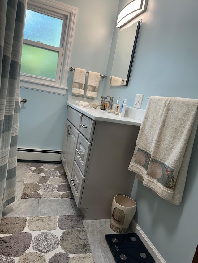 5 High St, Bedford Hills, NY 10507 - bathroom featuring a baseboard radiator and vanity