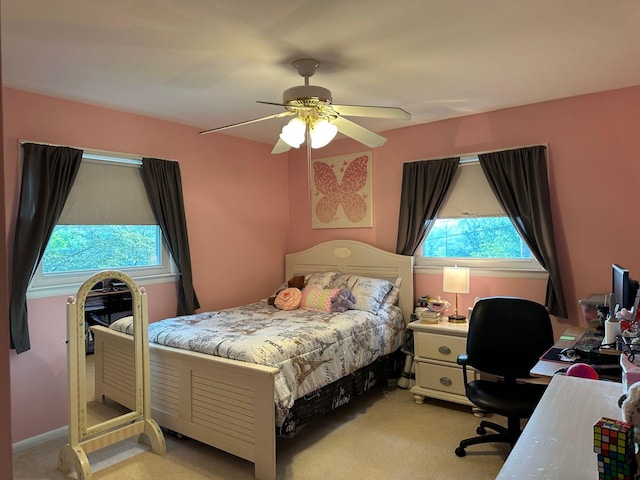 5 High St, Bedford Hills, NY 10507 - bedroom with light carpet, multiple windows, a desk, and ceiling fan