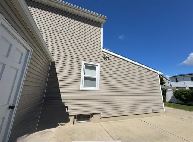 3805 Mansfield Dr, Seaford, NY 11783 - view of side of home featuring a patio