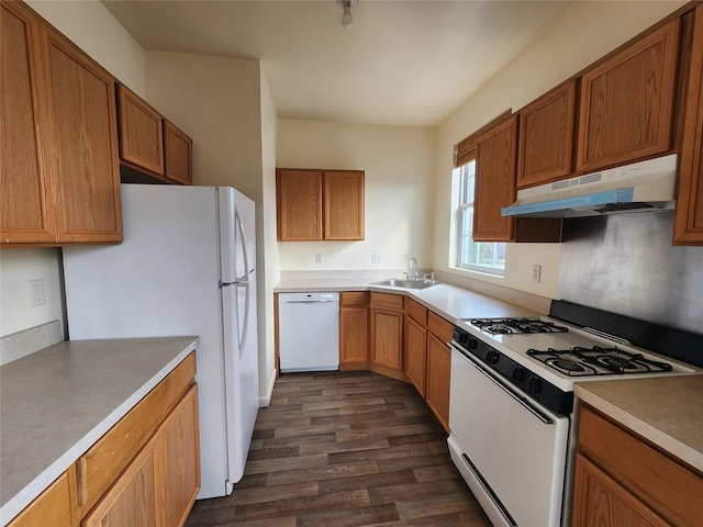 47 Pipetown Hill Radl, Nanuet, NY 10954 - kitchen with white appliances, under cabinet range hood, dark wood-style floors, and light countertops