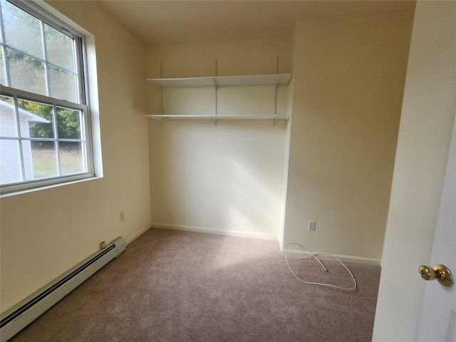 47 Pipetown Hill Radl, Nanuet, NY 10954 - empty room featuring a baseboard heating unit and carpet
