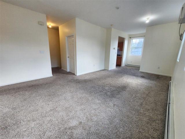 47 Pipetown Hill Radl, Nanuet, NY 10954 - carpeted empty room with a baseboard radiator and a baseboard heating unit