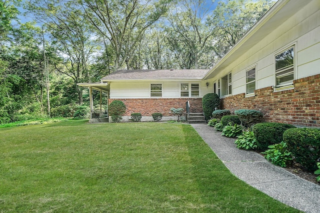 203 Deer Park Rd, Dix Hills, NY 11746 - view of front of house with brick siding and a front yard