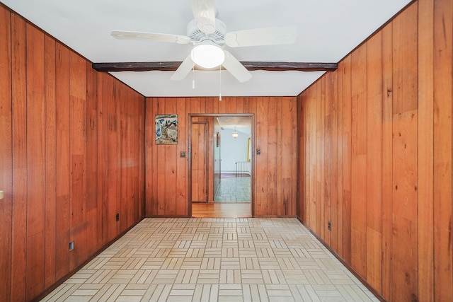 203 Deer Park Rd, Dix Hills, NY 11746 - empty room featuring wood walls and ceiling fan