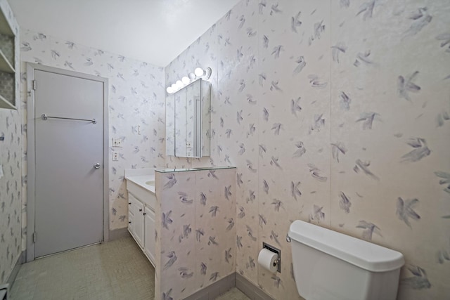 203 Deer Park Rd, Dix Hills, NY 11746 - bathroom with wallpapered walls, vanity, and tile patterned floors
