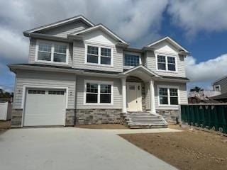 4 Kroll St, Plainview, NY 11803 - craftsman inspired home featuring driveway, a garage, and stone siding