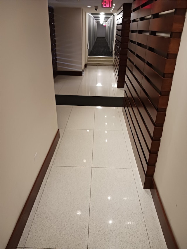 8710 51st Ave Unit 1P, Elmhurst, NY 11373 - hallway with stairs and baseboards