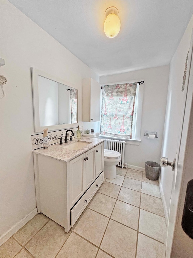 41 School St, Cortlandt Manor, NY 10567 - bathroom with vanity, radiator, and tile patterned floors