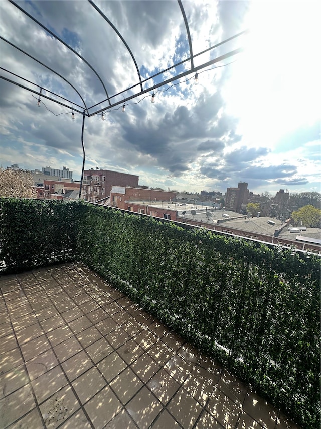 41-28 71st St Unit 4D, Woodside, NY 11377 - patio / terrace featuring a view of city