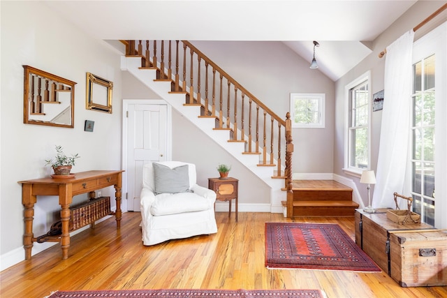 2860 Pine Tree Rd, Cutchogue, NY 11935 - entrance foyer with stairs, wood finished floors, and vaulted ceiling