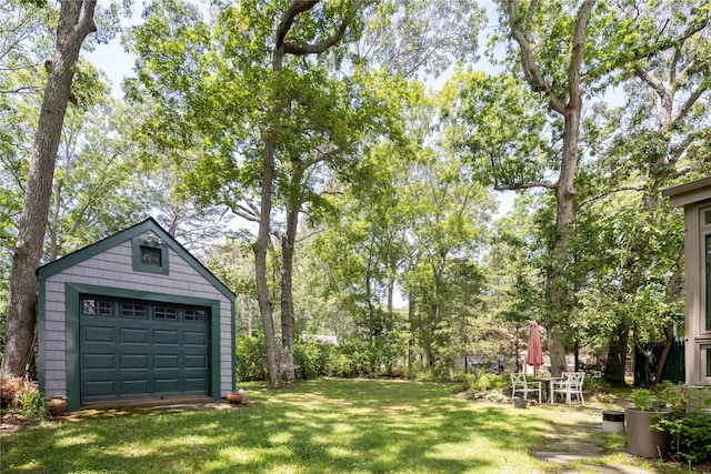 2860 Pine Tree Rd, Cutchogue, NY 11935 - view of grassy yard with an outbuilding and a detached garage