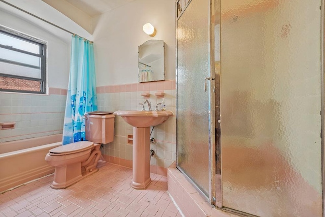 70-40 Utopia Pkwy, Fresh Meadows, NY 11365 - full bath with tile walls, shower / tub combo, and a wainscoted wall