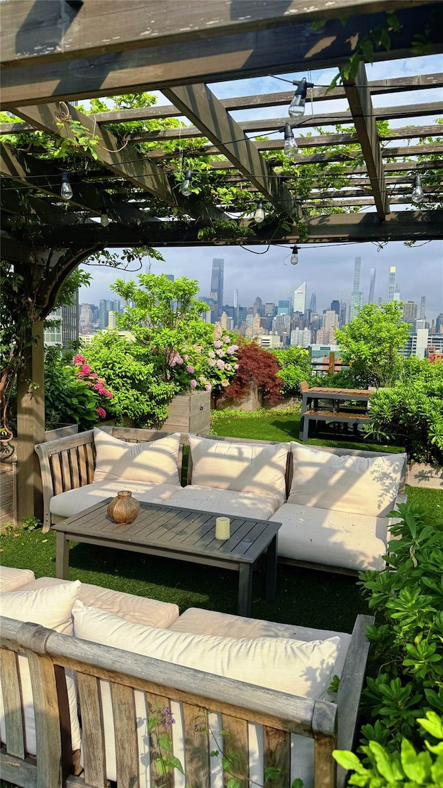 4260 Crescent St Unit 10C, Long Island City, NY 11101 - view of patio with a view of skyline, a pergola, and outdoor lounge area