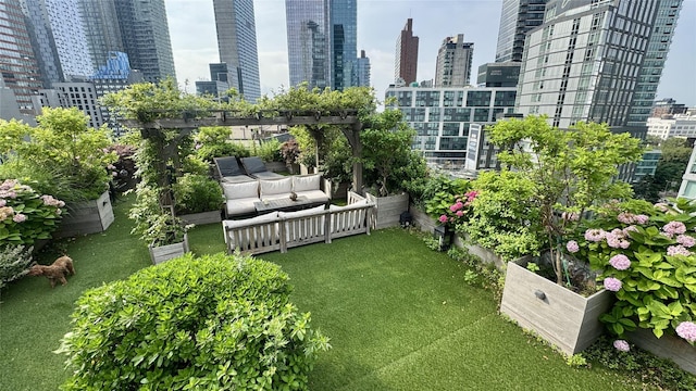 4260 Crescent St Unit 10C, Long Island City, NY 11101 - view of yard featuring a view of skyline and an outdoor hangout area