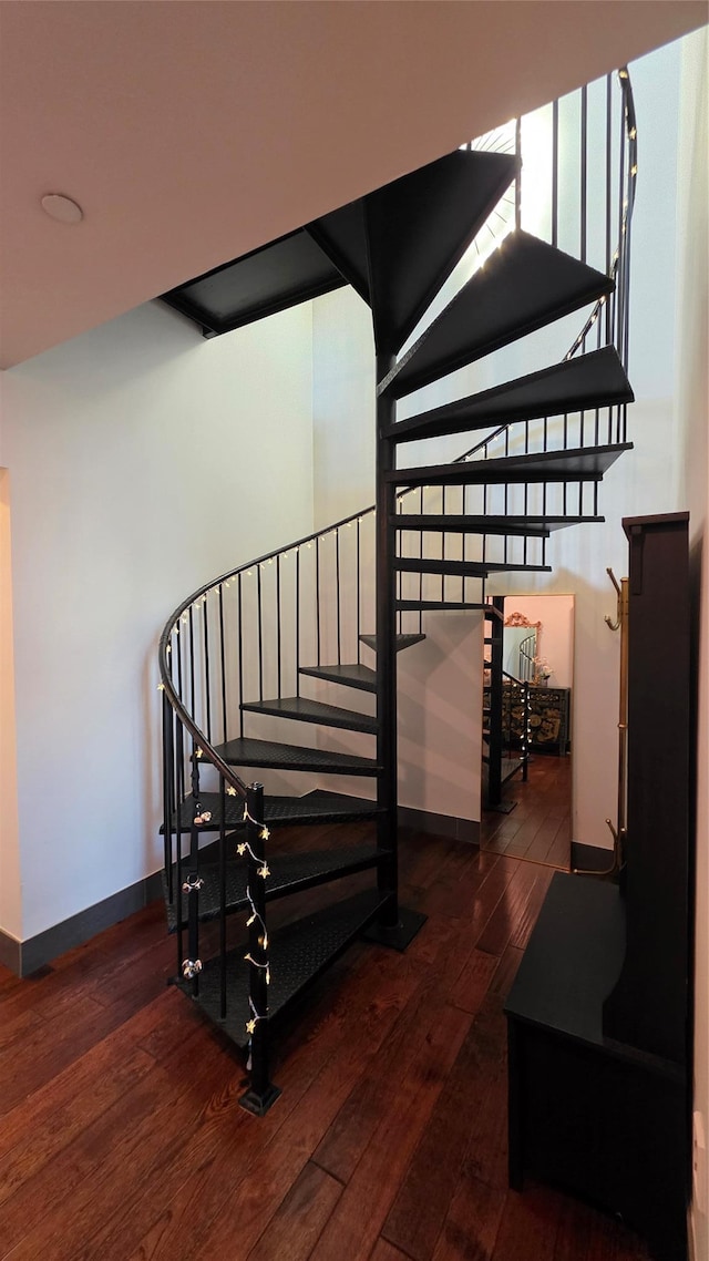 4260 Crescent St Unit 10C, Long Island City, NY 11101 - stairway featuring hardwood / wood-style floors and baseboards