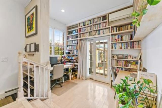 39-12 215th Pl, Bayside, NY 11362 - office area featuring a wall unit AC, wood finished floors, and recessed lighting