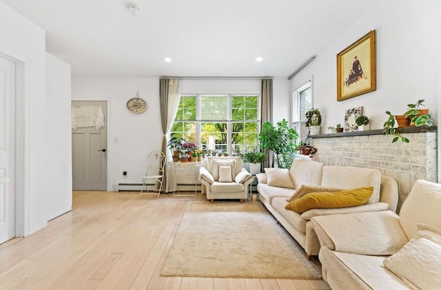 39-12 215th Pl, Bayside, NY 11362 - living room featuring hardwood / wood-style floors, recessed lighting, a baseboard radiator, and baseboard heating