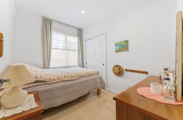 39-12 215th Pl, Bayside, NY 11362 - bedroom featuring light wood-type flooring, recessed lighting, and a closet