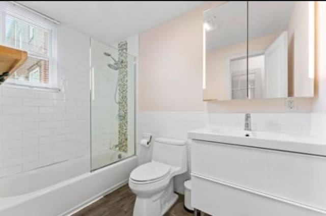 39-12 215th Pl, Bayside, NY 11362 - full bathroom with vanity, shower / bath combination, and wood finished floors