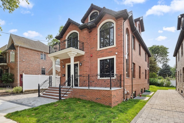35-26 221st St, Bayside, NY 11361 - view of front of property with a balcony and brick siding