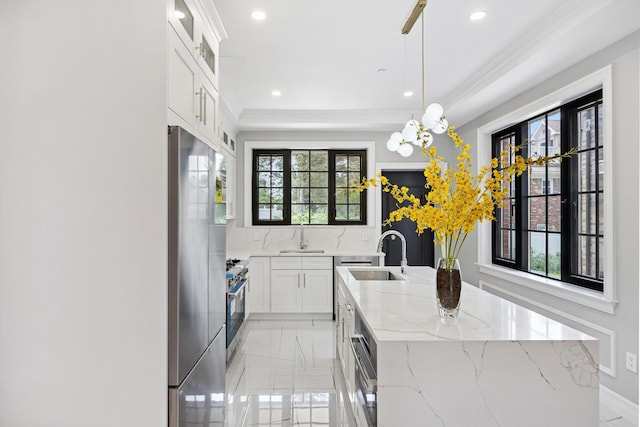 35-26 221st St, Bayside, NY 11361 - kitchen featuring light marble finish flooring, an island with sink, recessed lighting, healthy amount of natural light, and appliances with stainless steel finishes