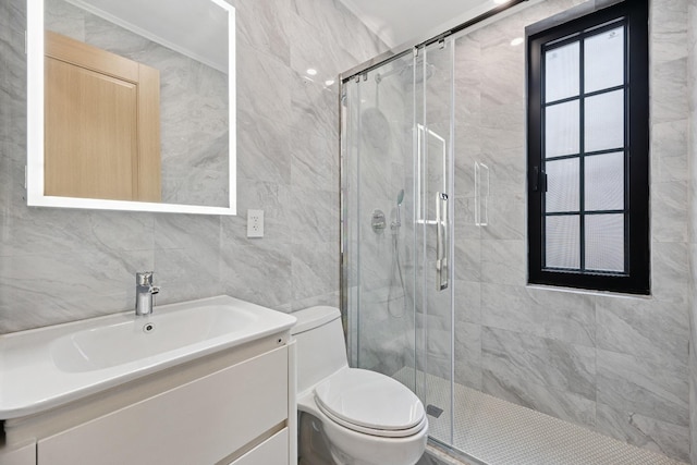 35-26 221st St, Bayside, NY 11361 - full bathroom featuring vanity, a stall shower, and tile walls
